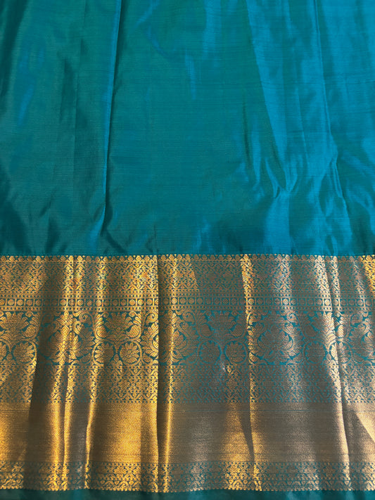 Elegant Purple Sari with Gold Accents and Green Border