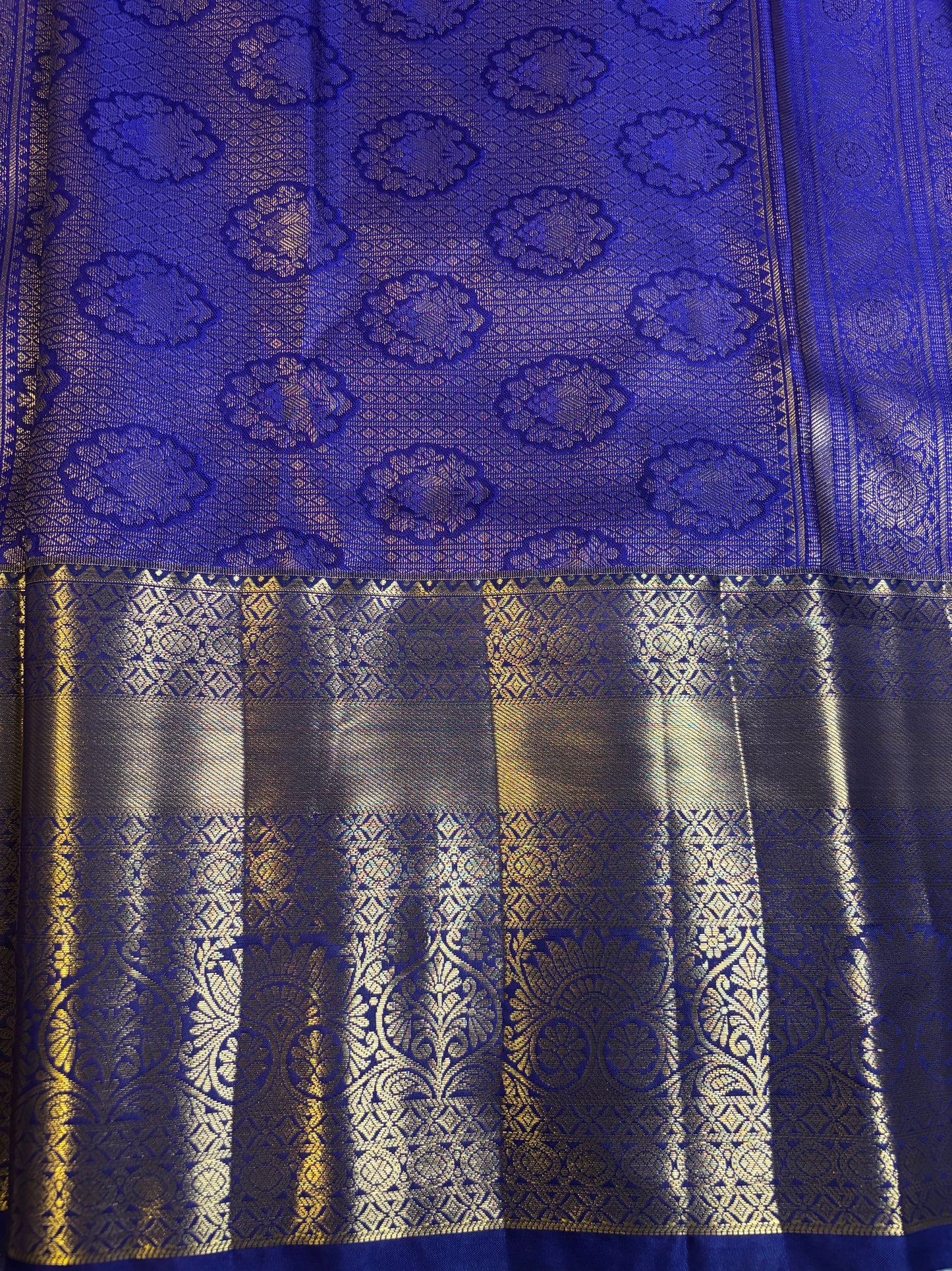 Turquoise Kanchipuram Silk Saree with Golden Floral Motifs and Dark Blue Border