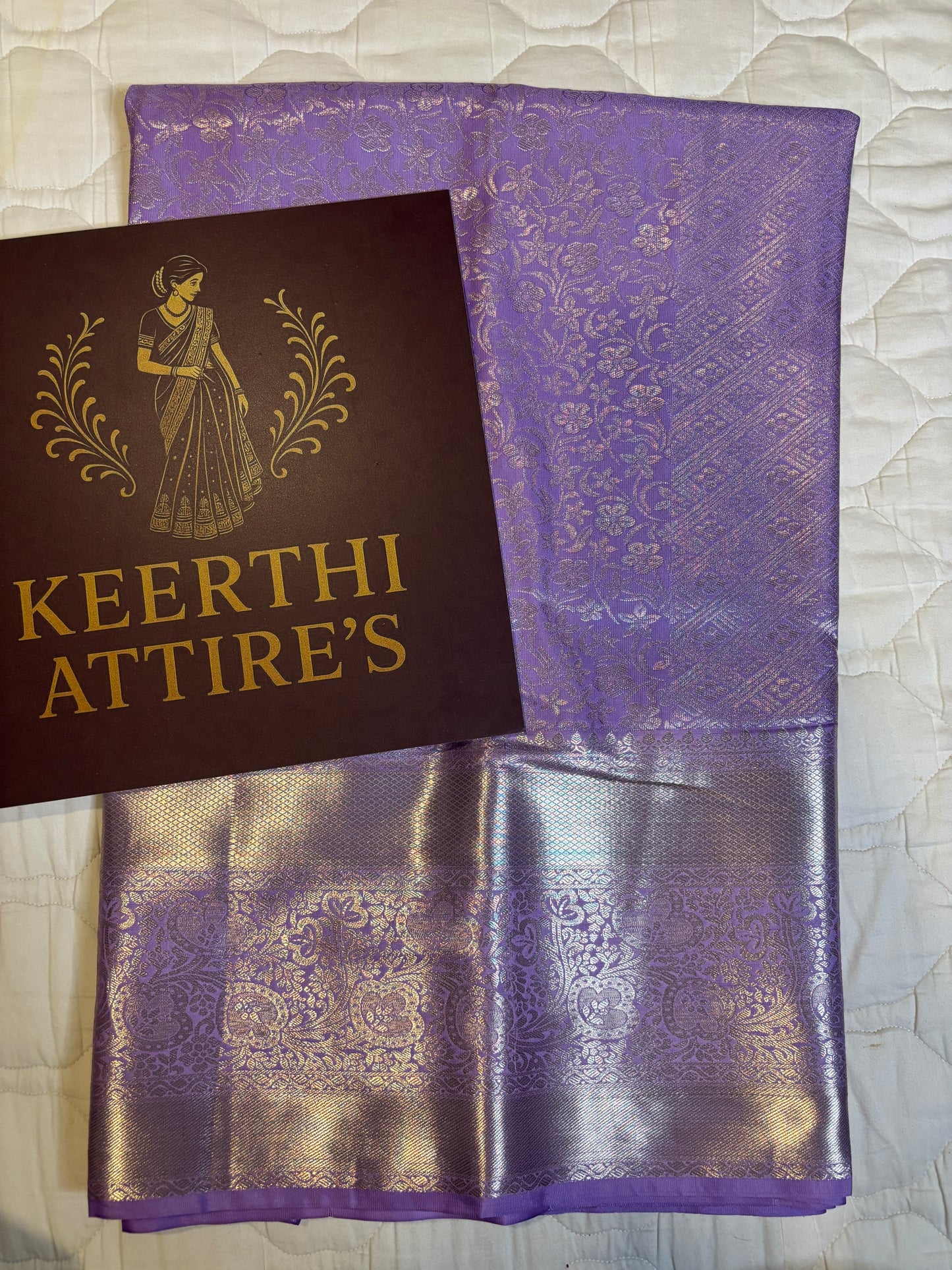 Elegant light lavendra Semi Silk Saree with Intricate Gold Design