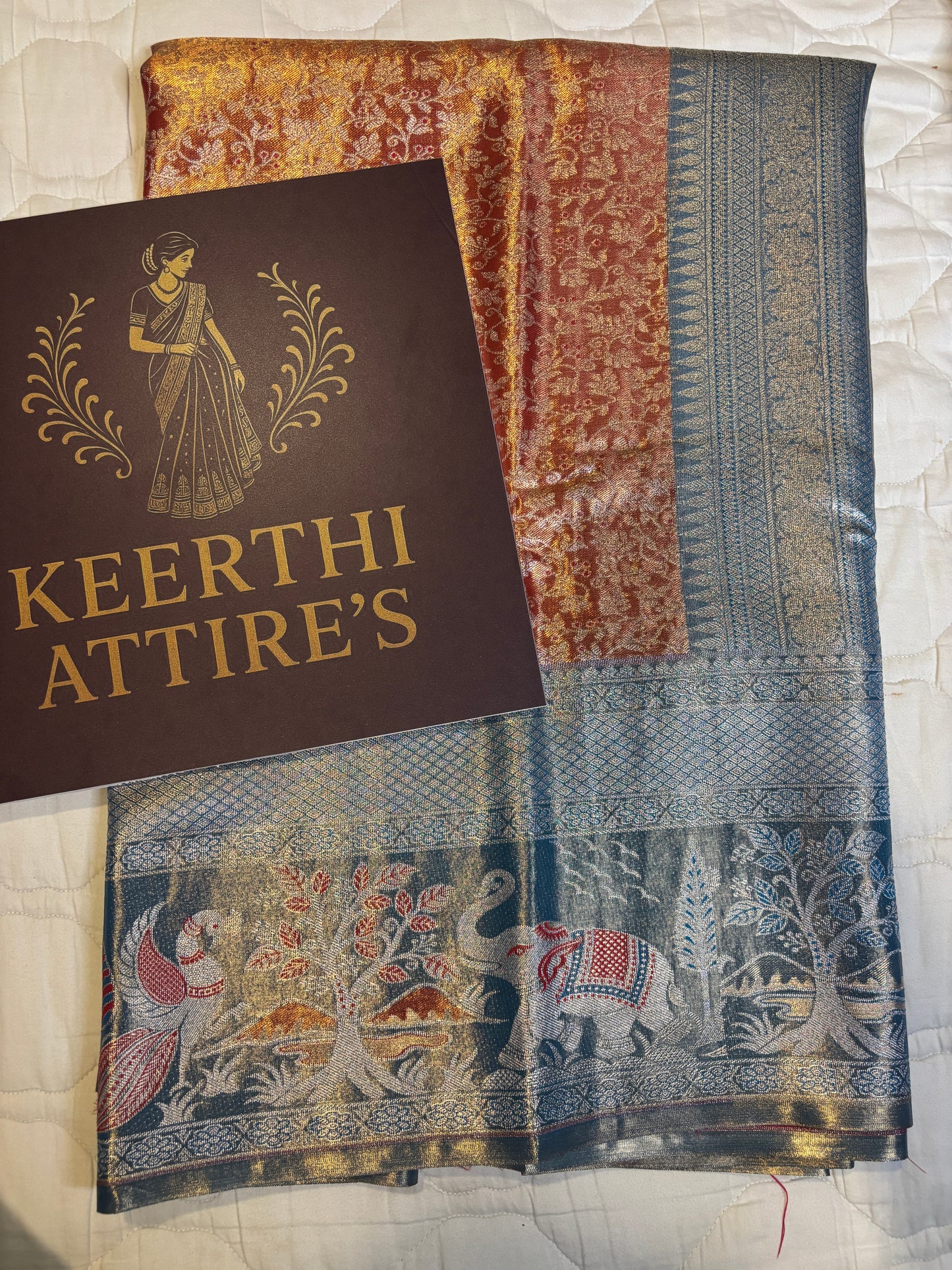 Orange Sari with Blue Border and Peacock- elephant Design