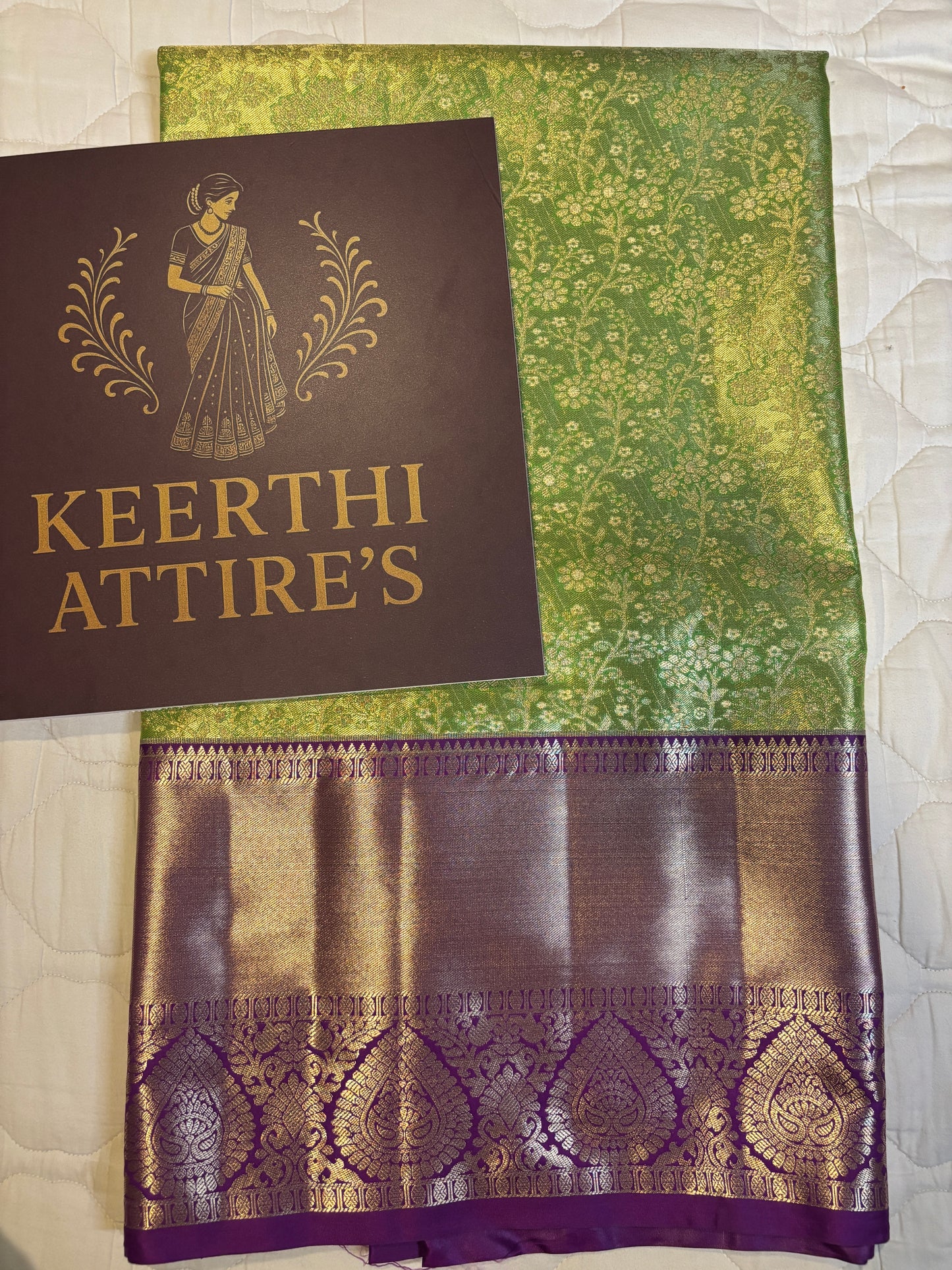 Elegant Green Kanchipuram tissue Saree with Pink Border