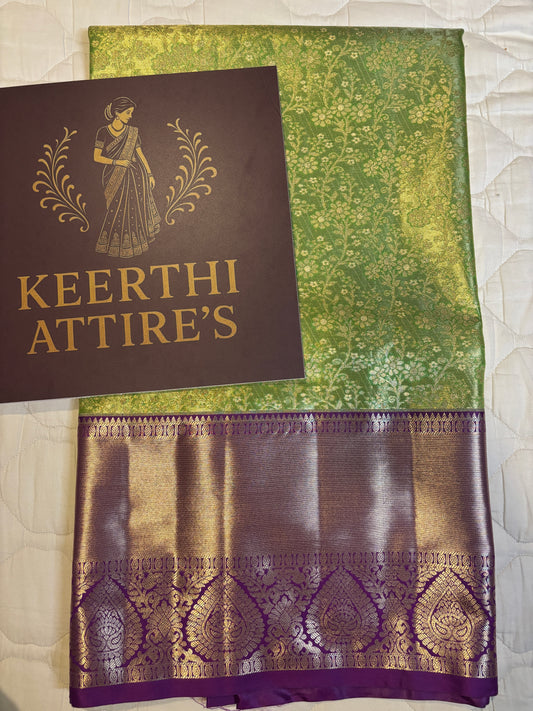 Elegant Green Kanchipuram tissue Saree with Pink Border