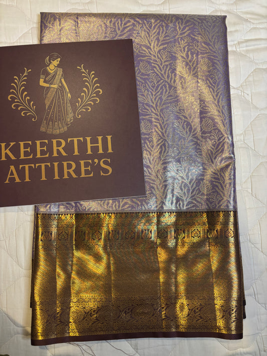 Regal Purple Kanchipuram tissue Saree with Gold Accents and brown border.